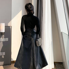 Black Mid-length Skirt With A High Waist And Slimming Hips