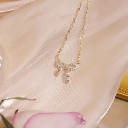 Exquisite copper inlaid zirconium sweet bow pendant necklace real gold plated sexy women prom party necklace Korean