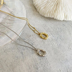 REETI Classic Geometric Silver Pendant Necklace - Elegant Accessory