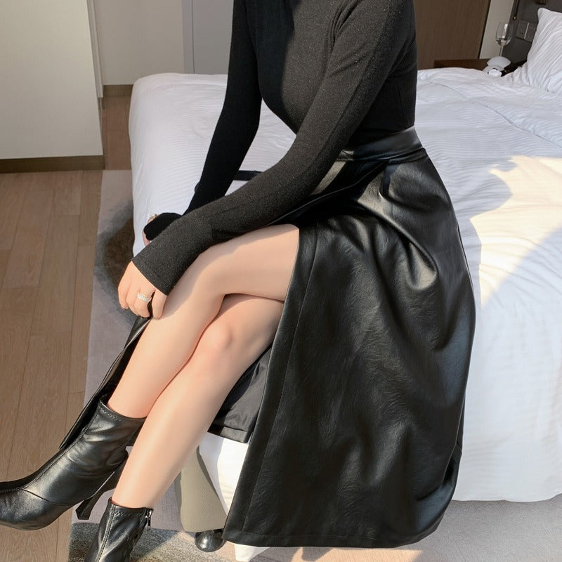 Black Mid-length Skirt With A High Waist And Slimming Hips